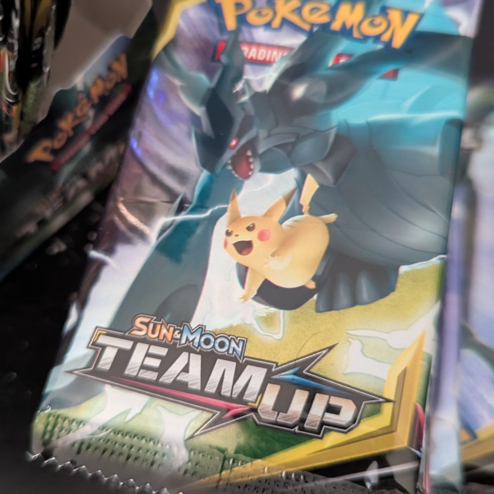Pokemon Team Up Booster Pack with Eevee and Pikachu